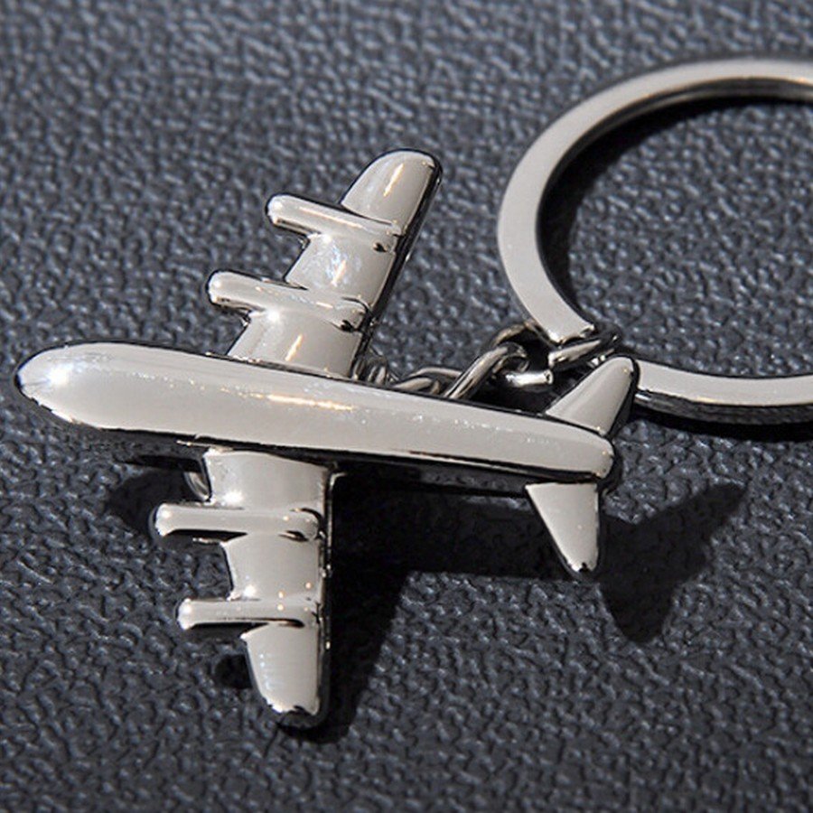 Porte-clés d'avion à réaction en cuir, avion de chasse, avion
